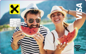 Kreditkarte mit persönlichen Bild aus dem Urlaub - ein Mann und eine Frau mit jeweils einem Stück Wassermelone in der Hand